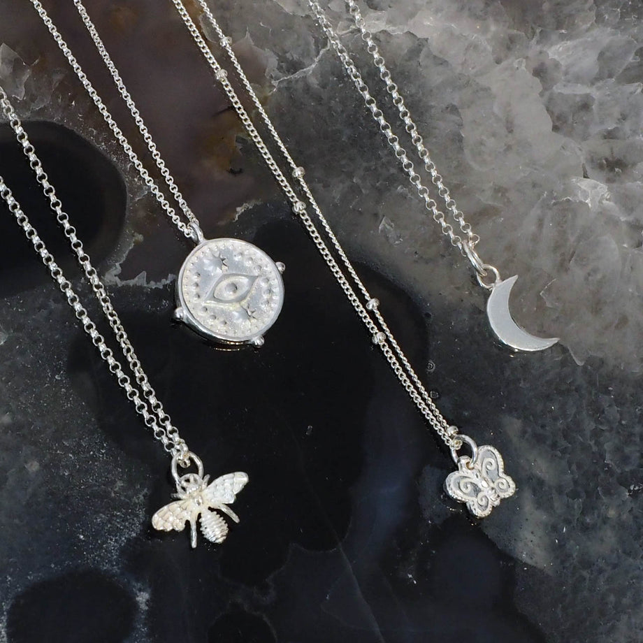 Evil eye coin necklace discount